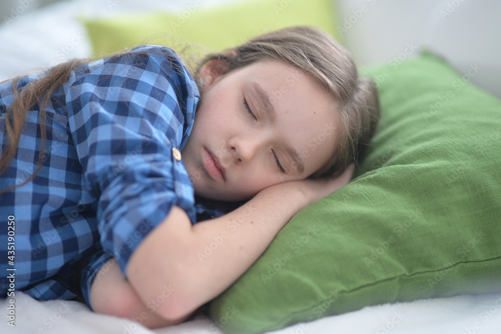 Cute little girl sleeping in bed at home Cute little girl sleeping in bed at home