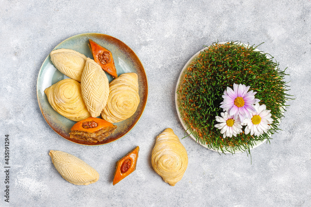 Traditional Azerbaijan holiday Novruz sweets,shekerbura,qogal,paxlava,mutaki. Traditional Azerbaijan holiday Novruz sweets,shekerbura,qogal,paxlava,mutaki.