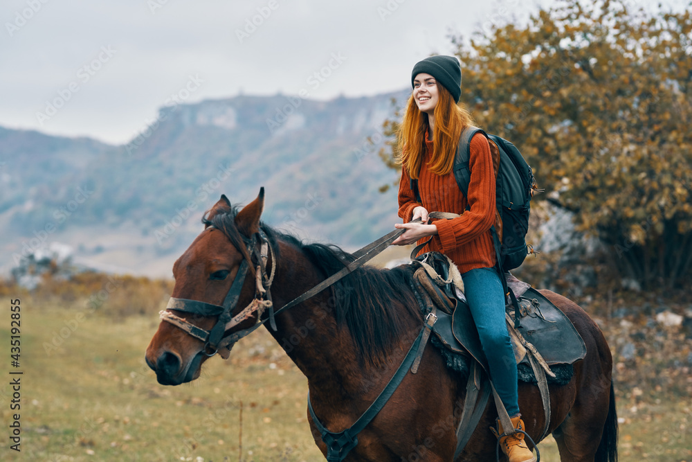 woman hiker ride horse mountains travel fresh air