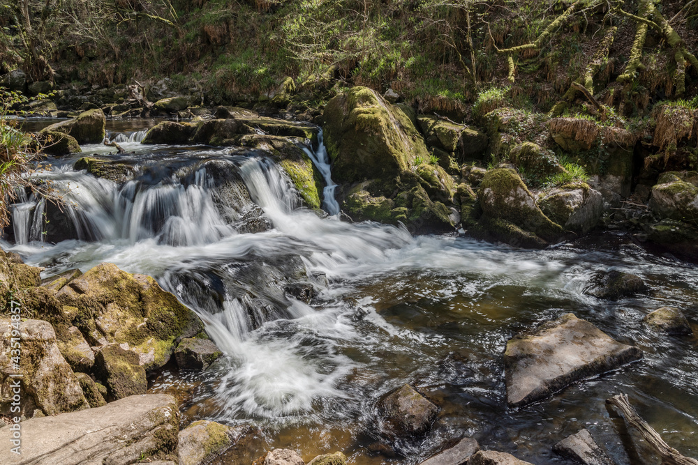 Stunning landscape image of River Fowey near Golitha Falls in Cornwall with long exposure milky water Stunning landscape image of River Fowey near Golitha Falls in Cornwall with long exposure milky water