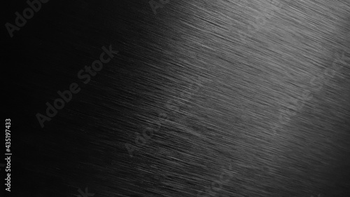 black metal texture background. aluminum brushed in silver color. close up hairline black stainless texture background for industrial or loft concept.