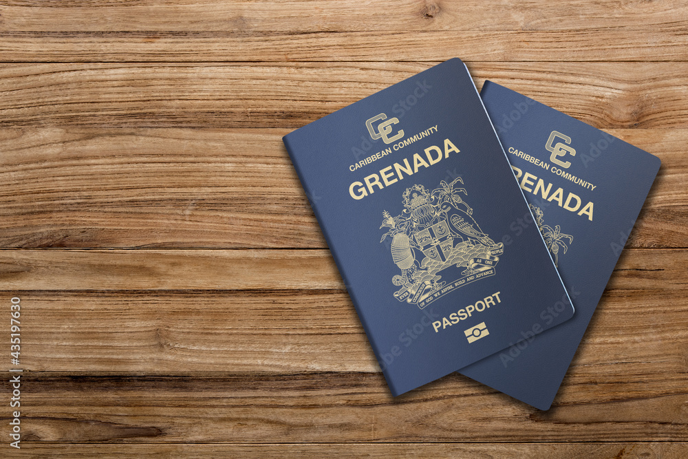 Grenada passport on a wooden background, for citizens of the state of Grenada
Grenada passport on a wooden background, for citizens of the state of Grenada