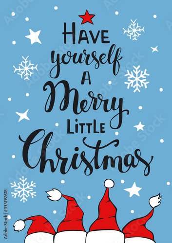 have yourself a merry little christmas handwritten typographic poster greeting card background with with santa claus hats snowflakes stars on blue texture