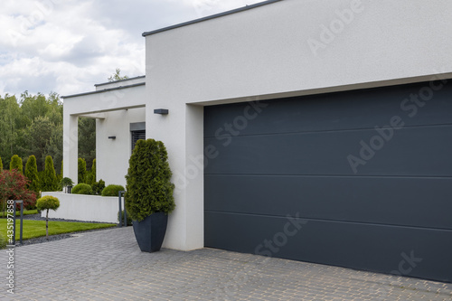 Photo View of the garage door in an elegant suburban home