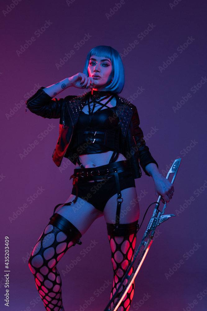 Female sensual fighter with sword in black outfit