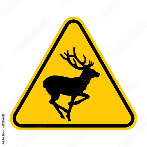 Deer crossing traffic sign. Vector illustration of yellow triangle warning sign with deer icon inside. Wild forest animals likely to be in road ahead. Caution deer. 
