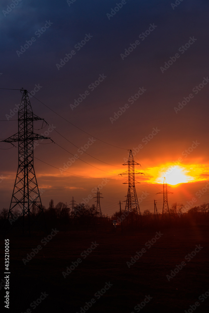 High voltage power line at sunset
