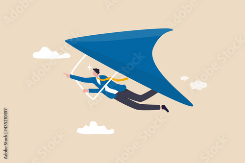 Business opportunity or aspiration to success in work and career, leadership to achieve target concept, ambitious businessman flying with glider high up to look for new business opportunity. photo