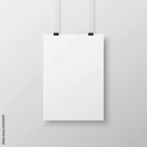 Realistic blank white paper hanging on office clip isolated on grey background. Mockup template for your design. Vertical empty sheet with shadow. Show your flyers, brochures, headlines. Vector