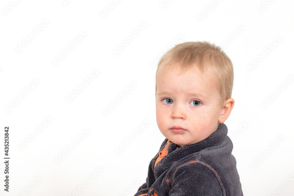 ortrait of little caucasian sad boy. Baby face with with bad emotions isolated on white background. ortrait of little caucasian sad boy. Baby face with with bad emotions isolated on white background.