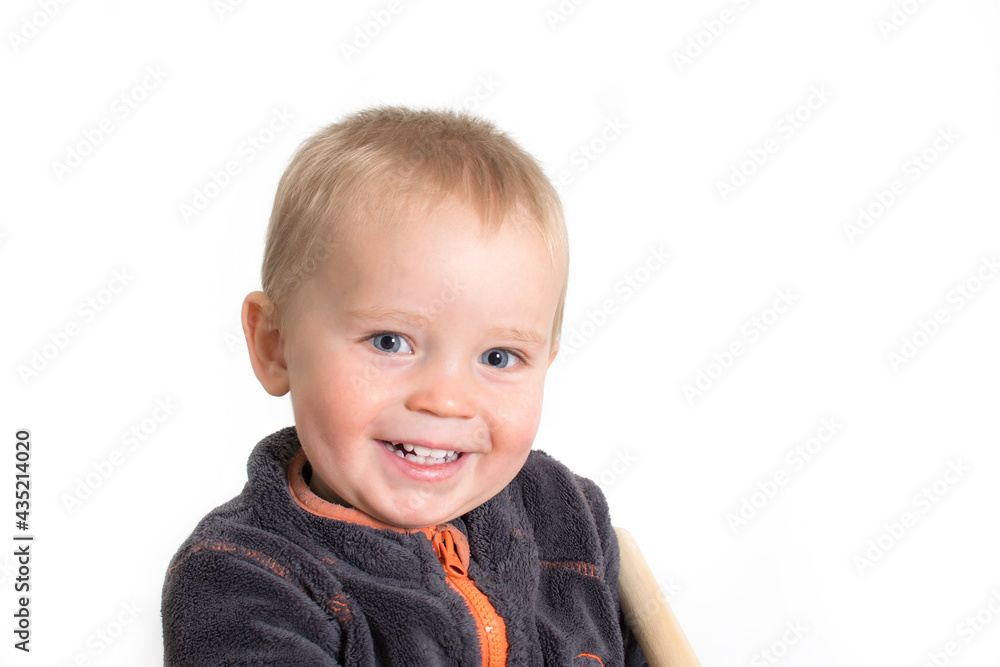 Portrait of little caucasian boy. Smiling baby face with white teeth isolated on white background. Portrait of little caucasian boy. Smiling baby face with white teeth isolated on white background.