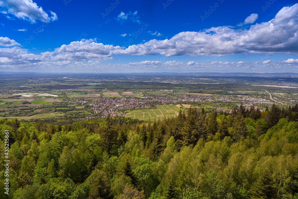 View from Fremersberg to the town of Sinzheim with the Rhine valley near Baden Baden. In the background the Vosges.  Baden Wuerttemberg, Germany