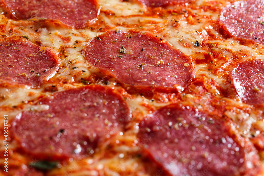 Salami pizza with cheese macro Salami pizza with cheese macro