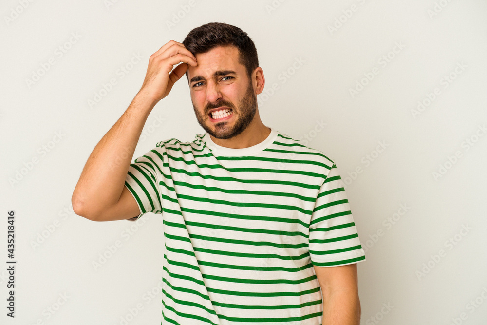 Young caucasian man isolated on white background forgetting something, slapping forehead with palm and closing eyes. Young caucasian man isolated on white background forgetting something, slapping forehead with palm and closing eyes.