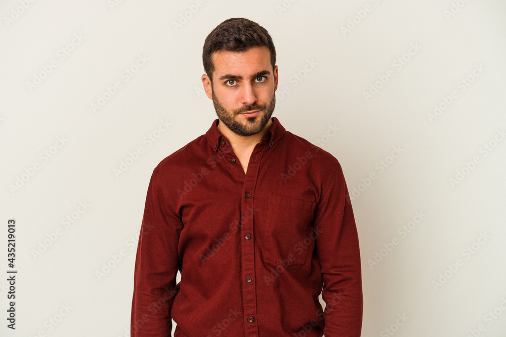 Young caucasian man isolated on white background sad, serious face, feeling miserable and displeased. Young caucasian man isolated on white background sad, serious face, feeling miserable and displeased.