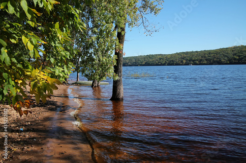 St. Croix River floods the shoreline at Afton State Park in Washington County, Minnesota. 