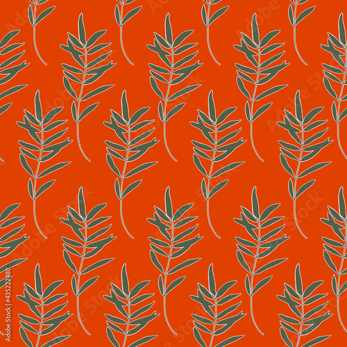 Pattern with palm leaves on the red background.