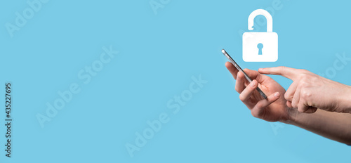 Male hand holding a lock padlock icon.Cyber security network. Internet technology networking.Protecting data personal information on tablet. Data protection privacy concept. GDPR. EU.Banner