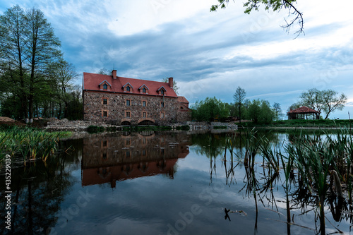 Old stone mill of the 19th century in the village of Dvorishche photo