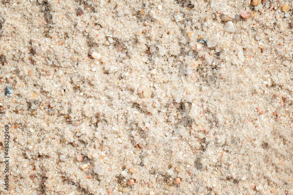 Sand with small stones. Summer background. Sand with small stones. Summer background.