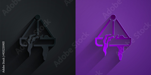 Paper cut Plant in hanging pot icon isolated on black on purple background. Decorative macrame handmade hangers for flower pot, hang indoor plants. Paper art style. Vector