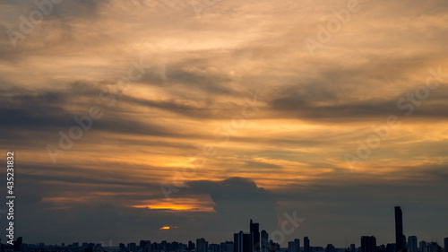 panoramic high-angle evening background of the city view with natural beauty and blurred sunsets in the evening and the wind blowing all the time showing the distribution of city center accommodation