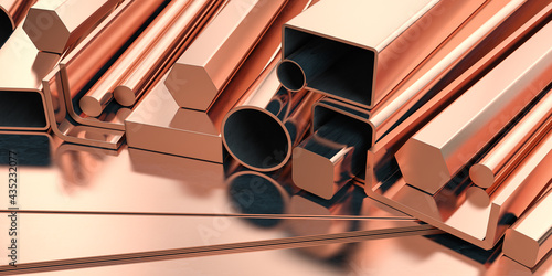 Foto Copper tubes and different profiles in warehouse background