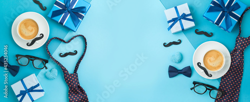 Happy Fathers day concept with coffee cup,  necktie and gift box on blue background