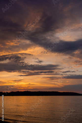 beautiful sunset over the river with orange colors