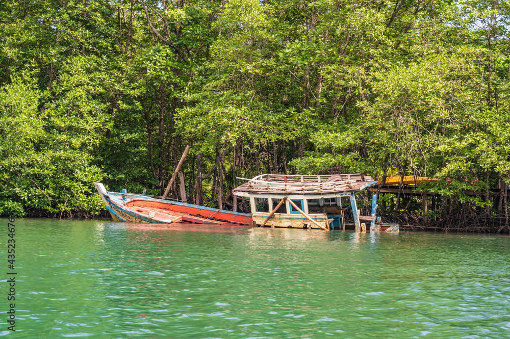 Fishing Ship wreck on Klong Chao river on koh kood island at trat thailand.Koh Kood, also known as Ko Kut, is an island in the Gulf of Thailand