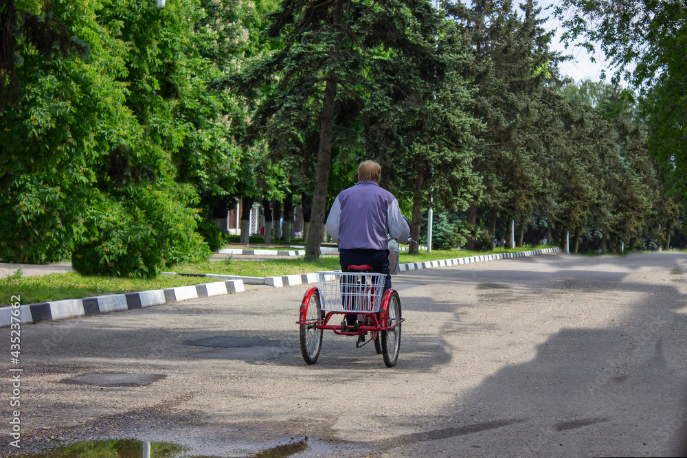 a man on a tricycle a man on a tricycle