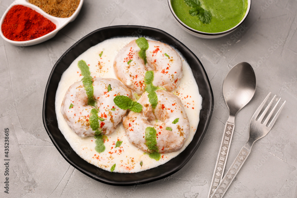 Indian street food thayir vadai Dahi vada Dahi Bhalla with green