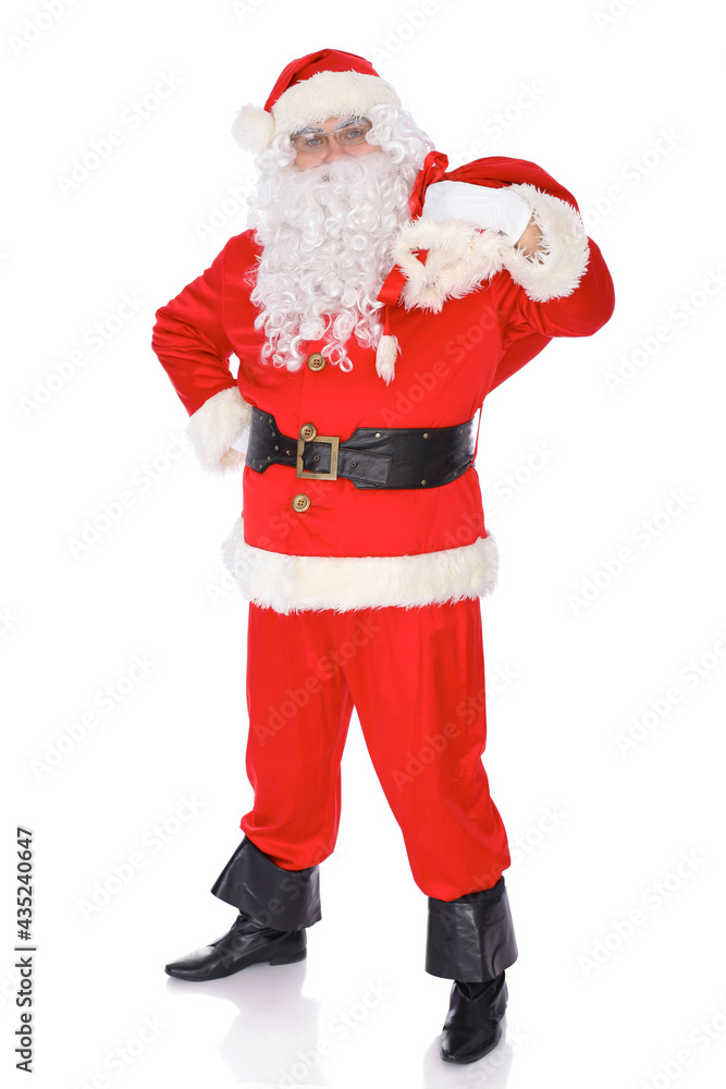 Santa Claus carrying big bag. Isolated on white background. Full length portrait Santa Claus carrying big bag. Isolated on white background. Full length portrait