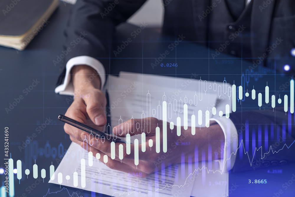 A client in formal wear reading the contract to invest money in stock market. Internet trading and wealth management concept. Checking the details of transaction at smart phone. A client in formal wear reading the contract to invest money in stock market. Internet trading and wealth management concept. Checking the details of transaction at smart phone.