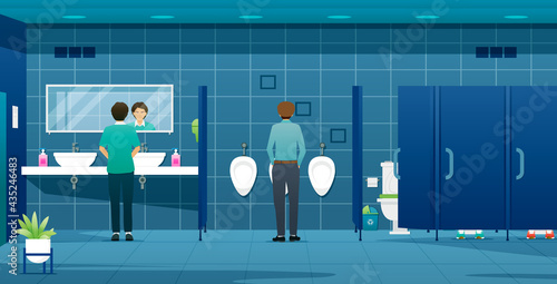 People and workers using male public toilets.