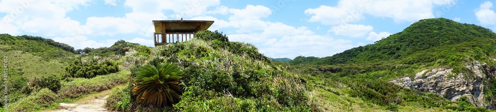 Beautiful mountain path and cottage at Chishi observation deck in Zamami island, Okinawa, Japan. Panoramic view - 日本 沖縄 座間味島 チシ展望台からの眺望