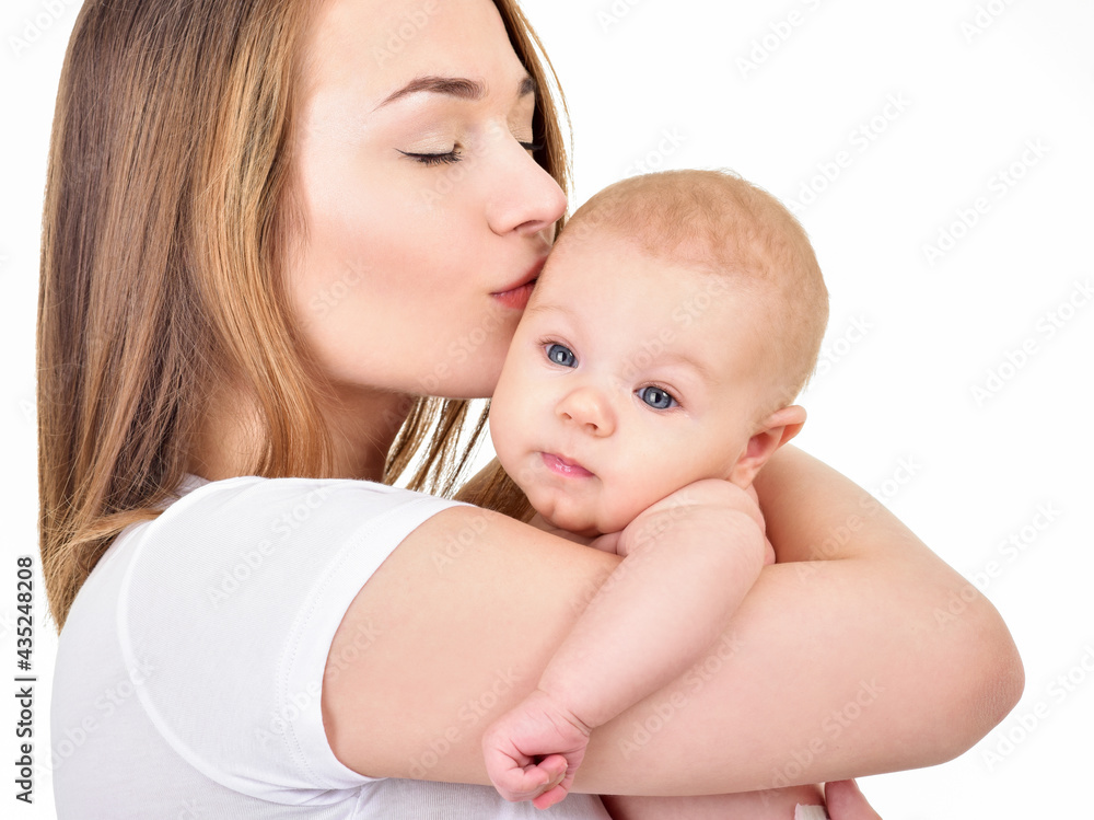 Mother and baby playing and smiling. Happy family. Mother and baby playing and smiling. Happy family.