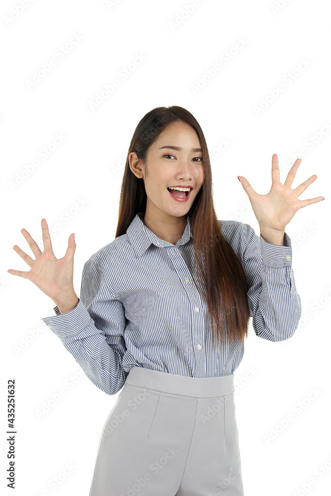 Portrait of happy smiling young beautiful Asian woman with long dark brown hair standing isolated on white background, surprised lady. Portrait of happy smiling young beautiful Asian woman with long dark brown hair standing isolated on white background, surprised lady.