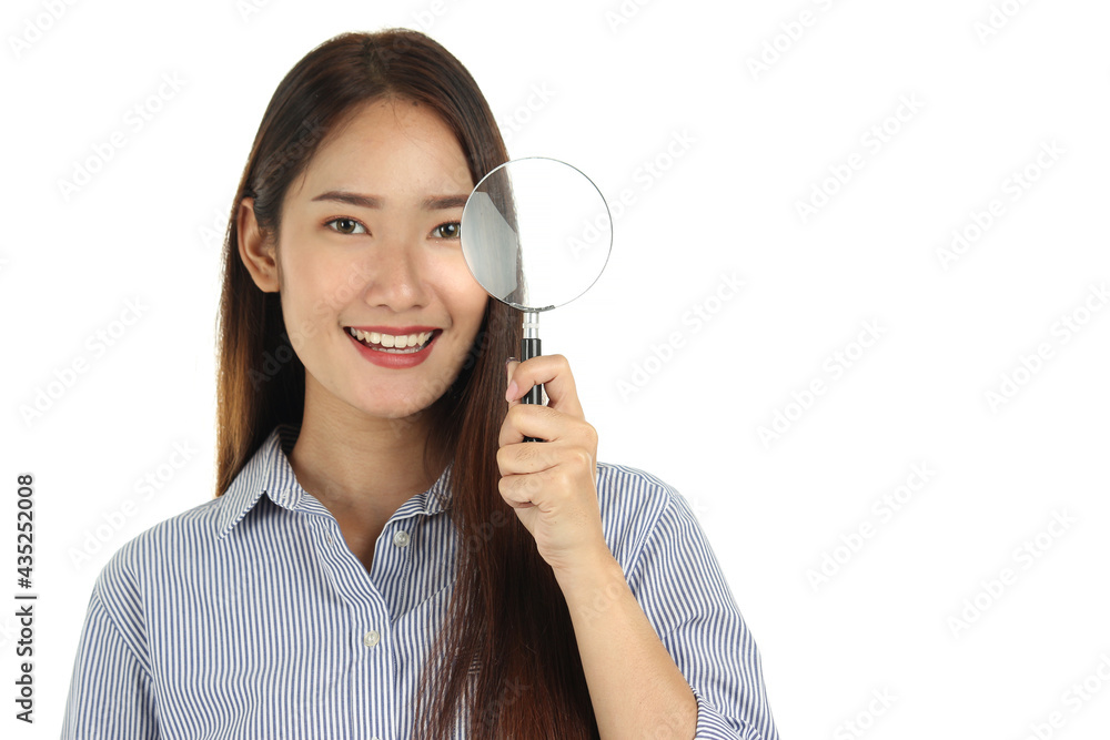 Portrait of young beautiful Asian woman with long dark brown hair holding magnifying glass isolated on white background Portrait of young beautiful Asian woman with long dark brown hair holding magnifying glass isolated on white background
