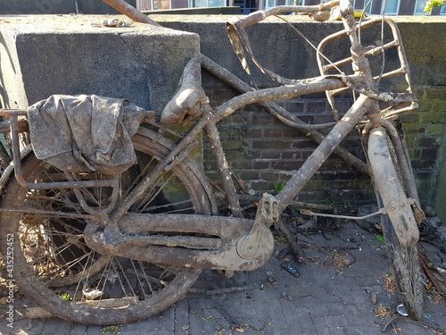 Rusty old broken down bicycle.