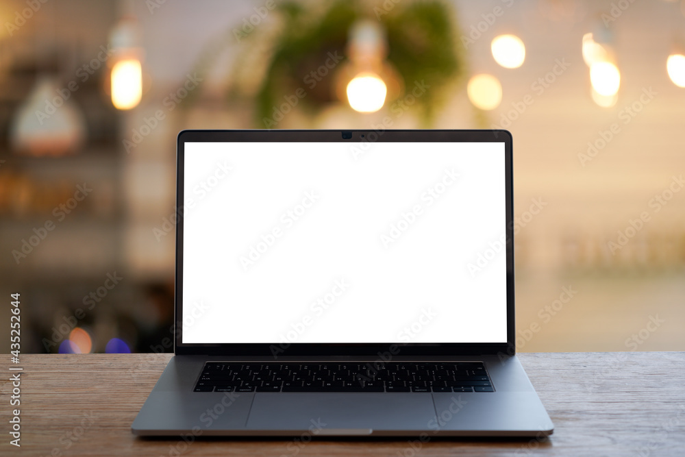 laptop on a wood table laptop on a wood table