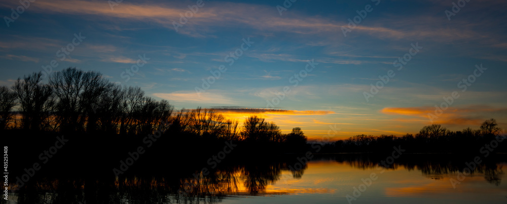 Sunset on the calm lake