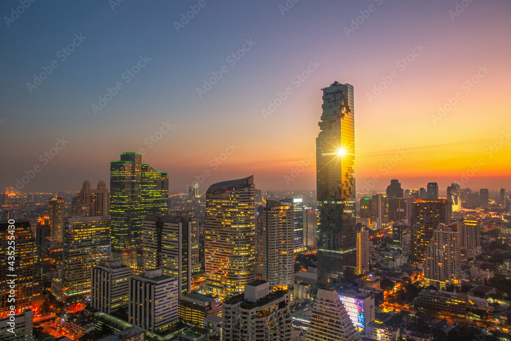 Naklejka premium The bird's eye view of sunset sky at KING POWER MAHANAKHON buildings ,it is the new highest building in Bangkok city.