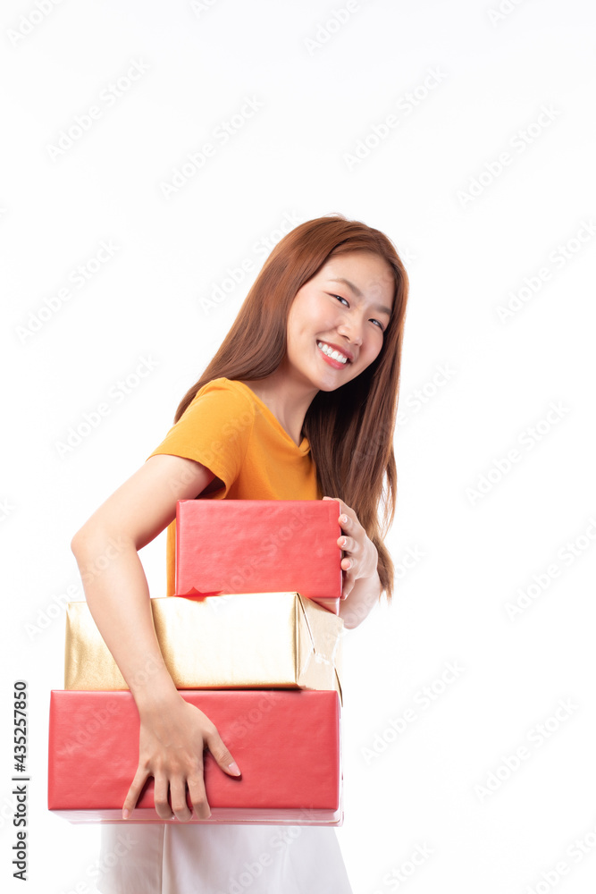 Attractive Asian woman holding gift box in christmas, new year, valentine day, birthday celebration concept. Portrait of smiling happy pretty girl hold gift box isolated on white with copy space. Attractive Asian woman holding gift box in christmas, new year, valentine day, birthday celebration concept. Portrait of smiling happy pretty girl hold gift box isolated on white with copy space.