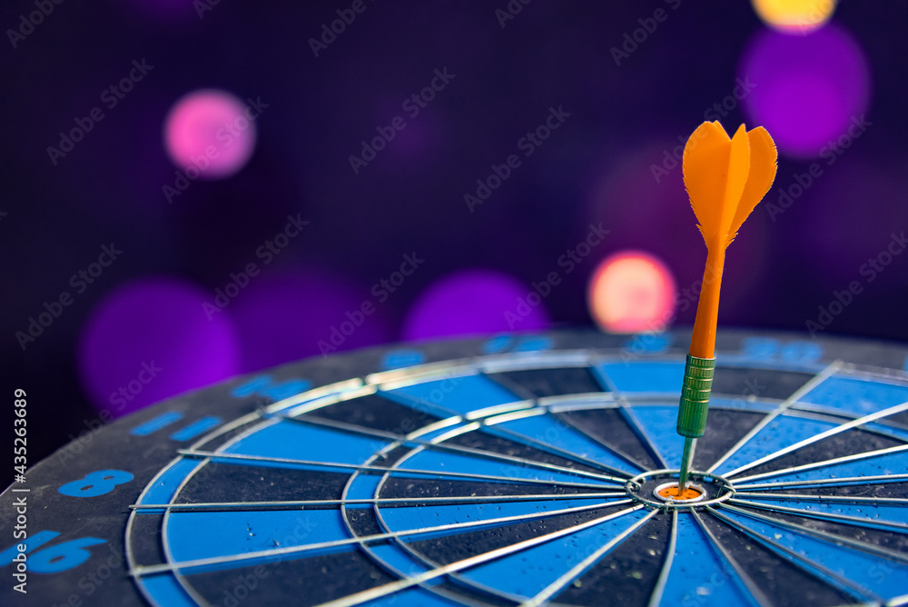 Fototapeta premium Bullseye is a target of business. Dart is an opportunity and Dartboard is the target and goal. So both of that represent a challenge in business marketing as concept.