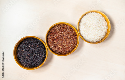 top view of black, red and white long-grain rice © Ekaterina