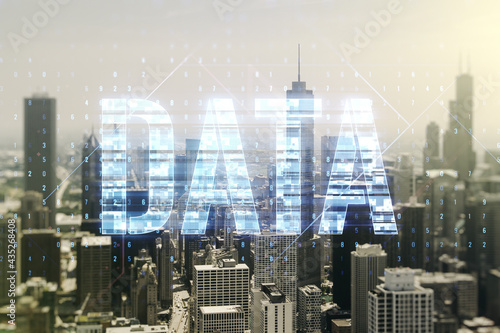 Data word hologram on Chicago office buildings background  big data and blockchain concept. Multiexposure
