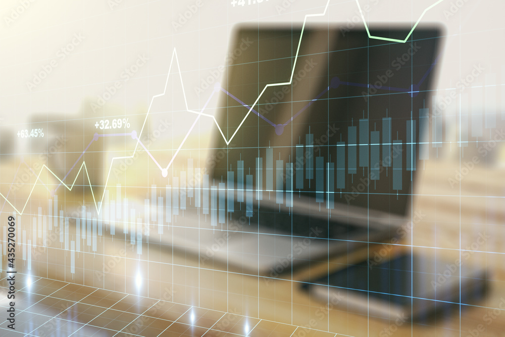 Abstract creative financial graph and modern desktop with computer on background, forex and investment concept. Multiexposure Abstract creative financial graph and modern desktop with computer on background, forex and investment concept. Multiexposure