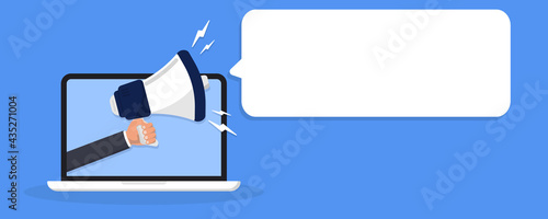 Hand holding megaphone coming out from laptop. Digital marketing, internet targeted, promotional campaign, online notification, e-marketing, internet promo, online advertisement. laptop with megaphone