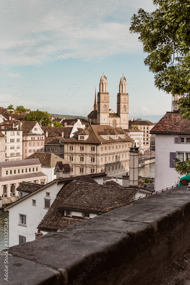 View of historic Zurich city center with famous Grossmunster Church from Lindenhof park, Zurich, Switzerland